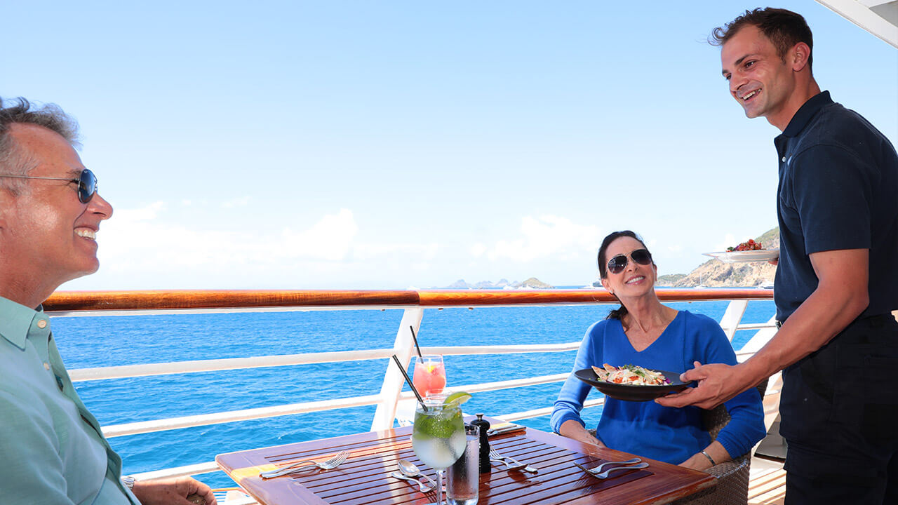 Couple enjoying al fresco dining service